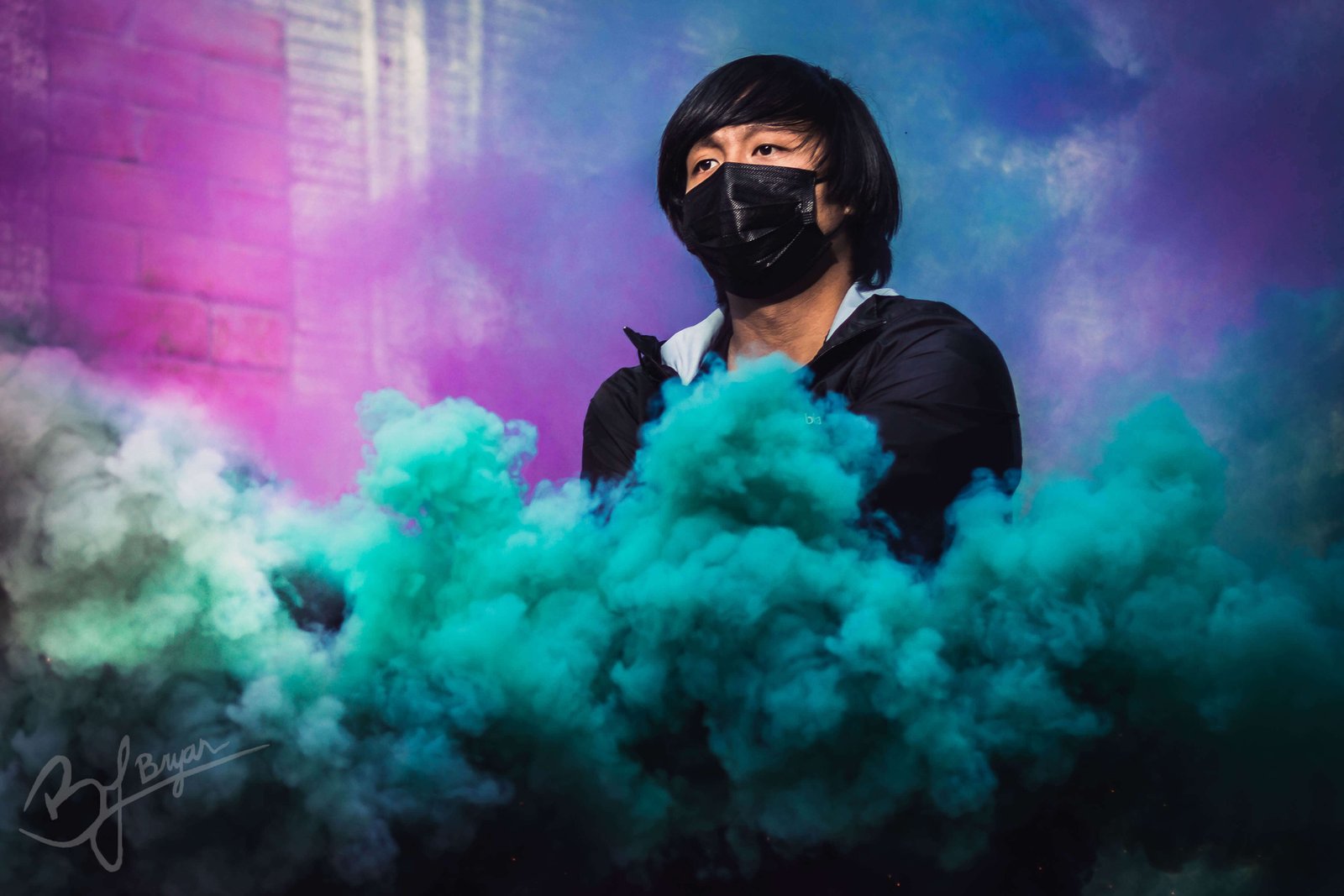 a man in a cloud of smoke